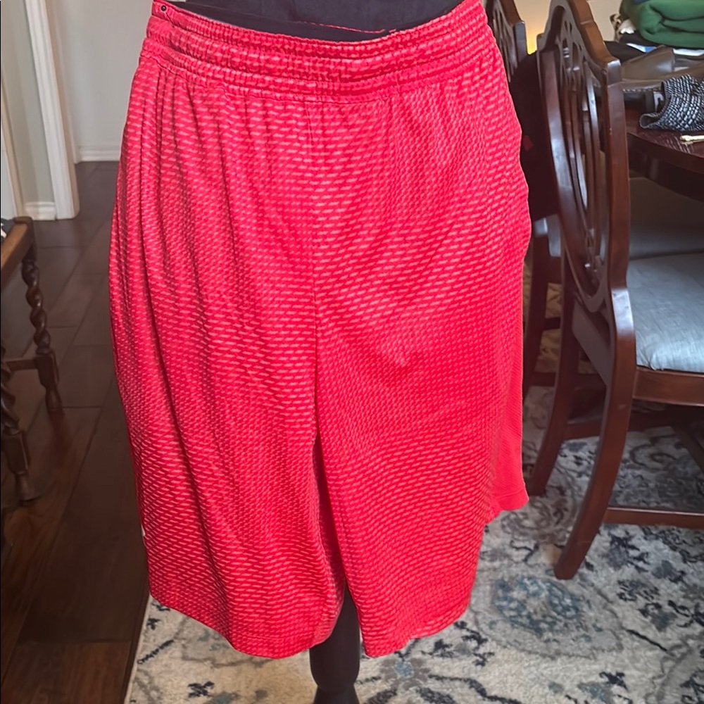 Vibrant Red Under Armor shorts